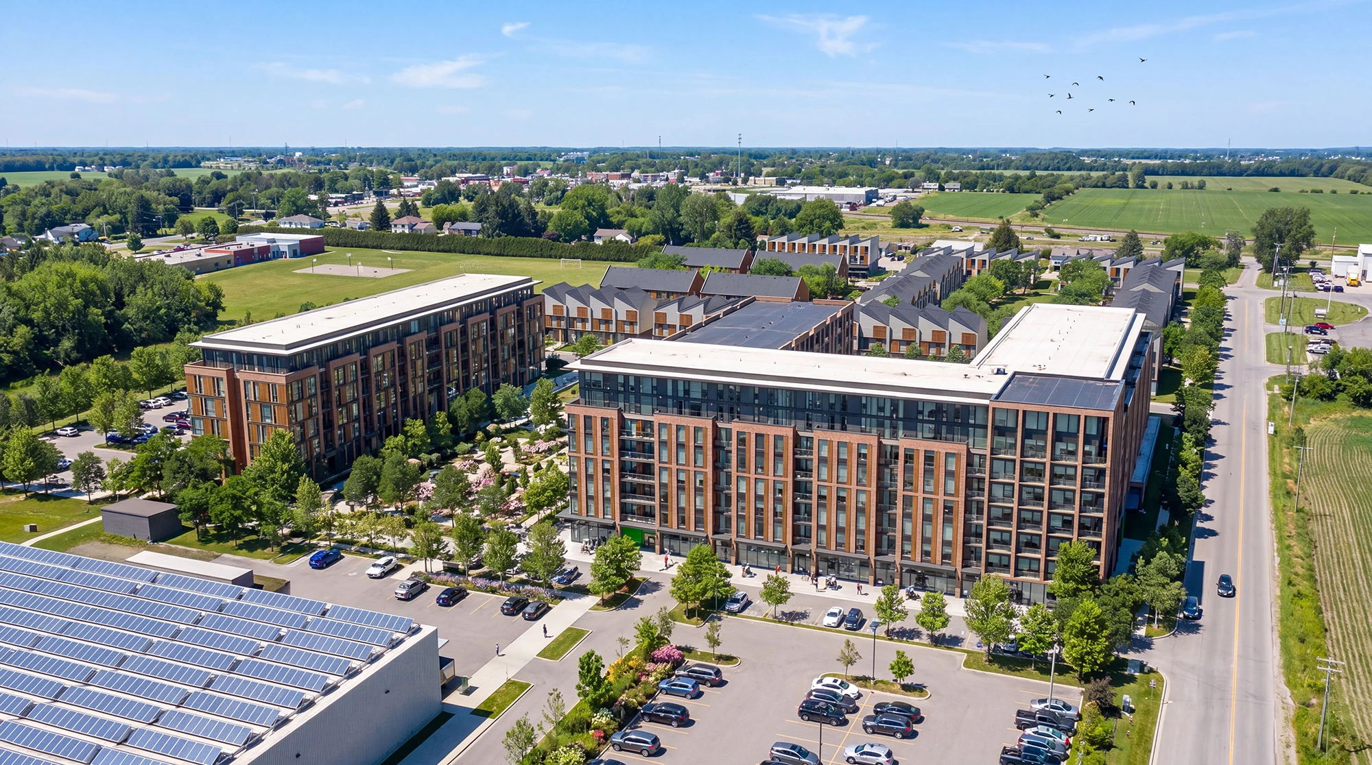 Aerial view of the completed Unity Square Phase 2 buildings beside the Phase 1 townhomes